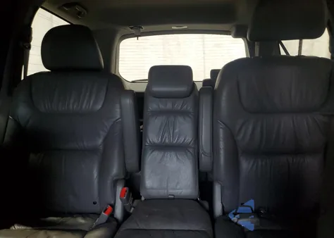 2010 Honda Odyssey Touring z USA, uszkodzony, nr VIN 5FNRL3H99AB061403